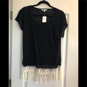 Black short sleeved blouse with fringe